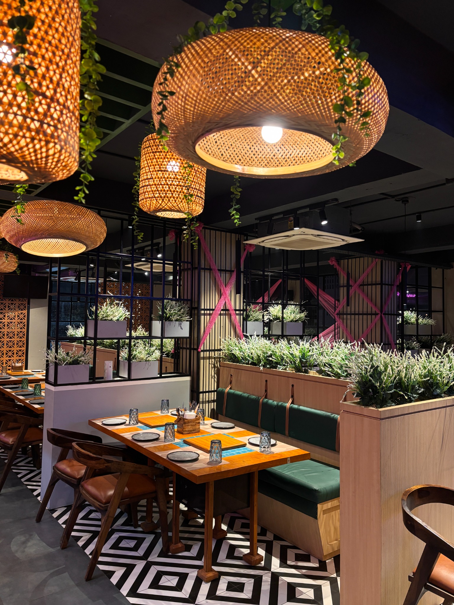 Cozy dining booth with plants
